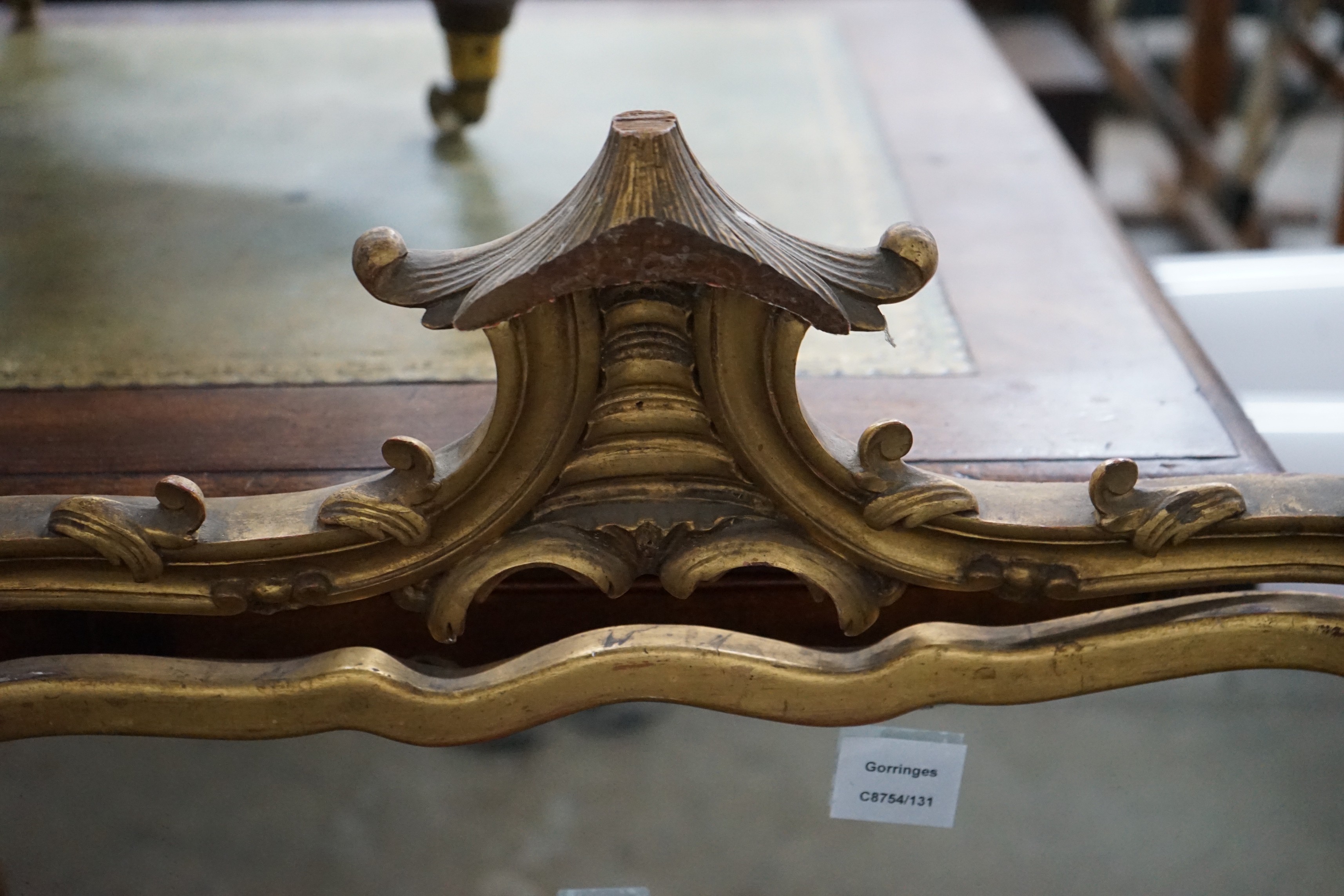 An early 20th century carved giltwood triptych dressing table mirror, width 136cm, height 89cm